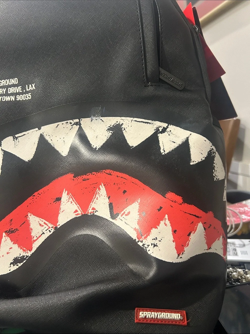 Sprayground Black with Red & White Shark Jaw Backpack